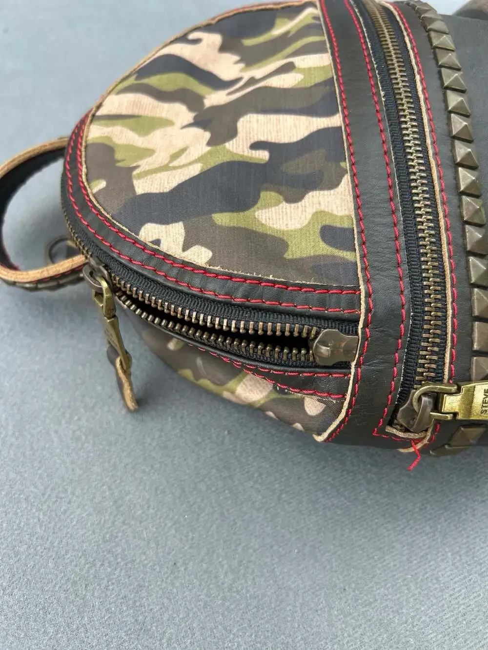Steve Madden Margot Studded Camo and Leather Mini Backpack